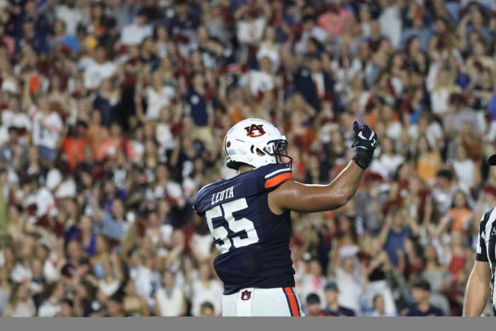 Eku Leota gets the crowd fired up during a goal line stand for the Tigers against San Jose State.